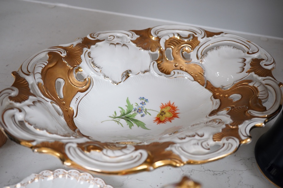 A collection of Meissen and other German porcelain vases and dishes etc. and a Worcester comport, tallest 34cm